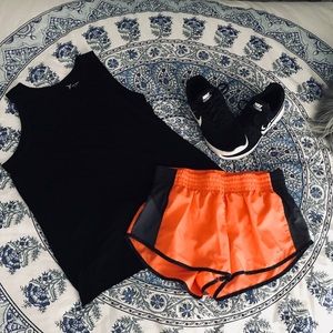 Nike orange Dri Fit running shorts